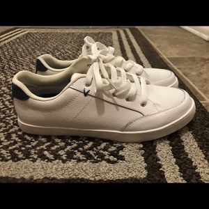white leather sneakers
